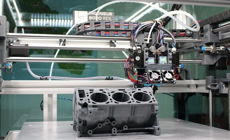 3D printing machine producing engine block prototype 3D printing machine producing engine block prototype