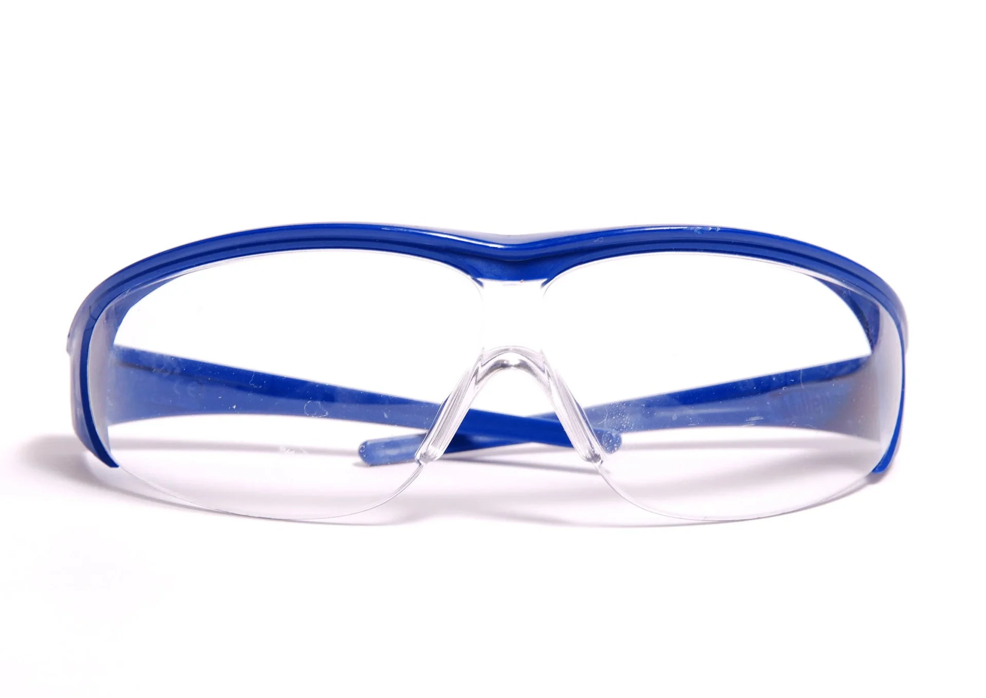 A pair of blue and clear polycarbonate safety goggles A pair of blue and clear polycarbonate safety goggles