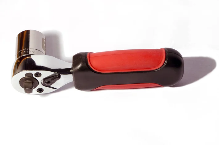 Overmolded automotive tool handle providing improved grip and user comfort Overmolded automotive tool handle providing improved grip and user comfort