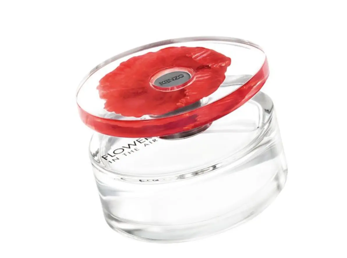 Overmolded perfume bottle cap showcasing aesthetic design and functional durability Overmolded perfume bottle cap showcasing aesthetic design and functional durability