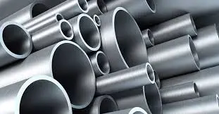 Stacked steel pipes of various diameters with a shiny metallic surface Stacked steel pipes of various diameters with a shiny metallic surface